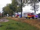 Sicherungsarbeiten an beschädigtem Telefonmast